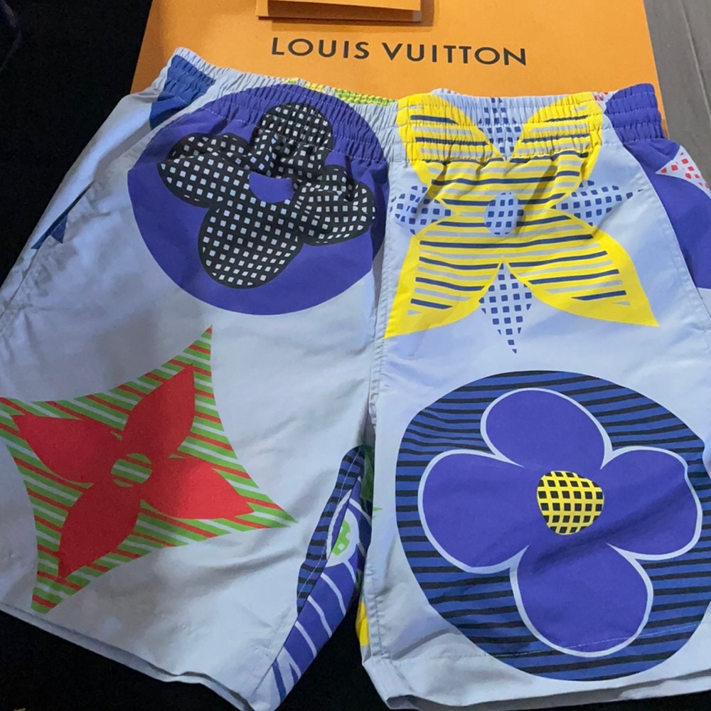 Brand New Louis Vuitton multicolor monogram board shorts for sale.